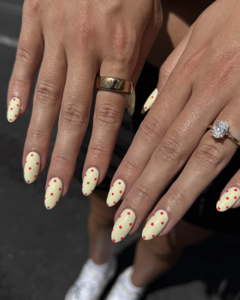 yellow polka dot nails